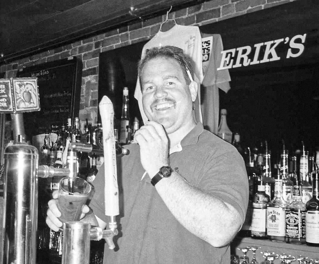 Bob's brother operating a bar tap in the 1980's
