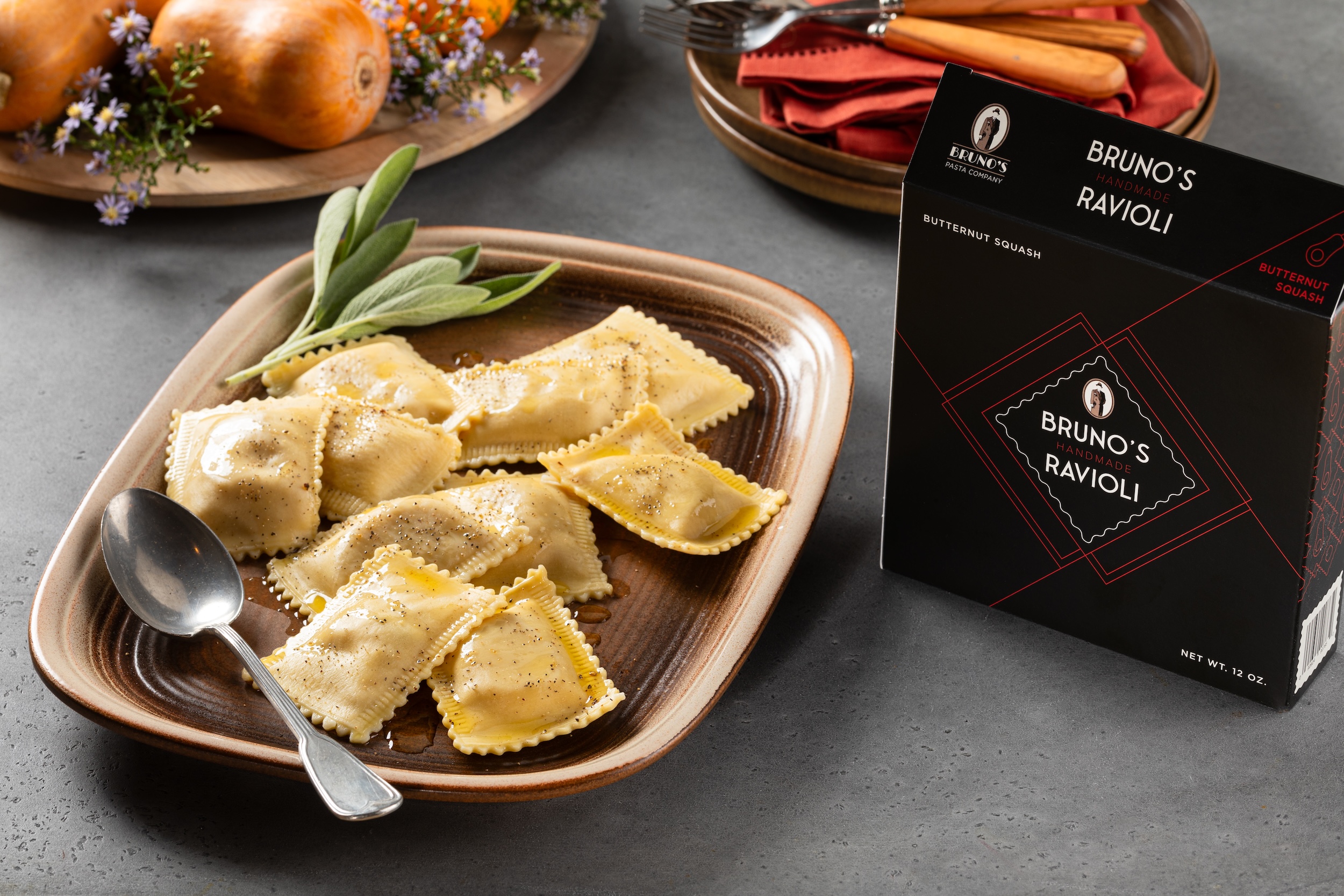 Bruno's roasted butternut squash ravioli tossed in oil on a plate
